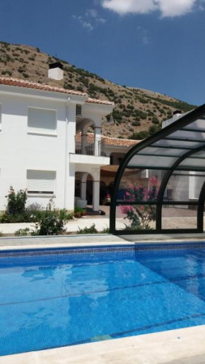 Отель Apartamentos Turísticos Rurales Monte de las Ánimas  Хаэн